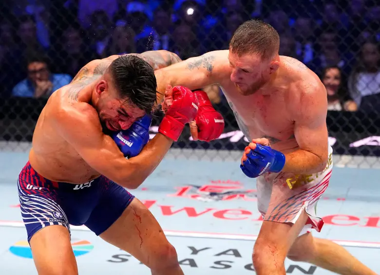 ustin Gaethje derrotó a Illia Topuria y conquistó el cinturón del peso ligero de la UFC. FOTO: GETTY
