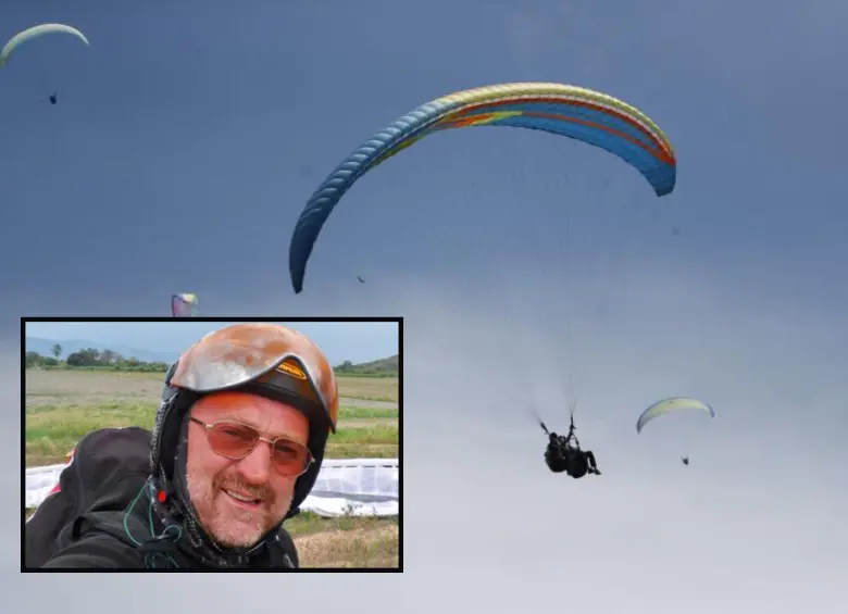 Adelante, Witold Gilarski, desaparecido en Santa Fe de Antioquia. Atrás, imagen de referencia de un grupo de parapentistas en pleno vuelo en Antioquia. FOTOS: EL COLOMBIANO