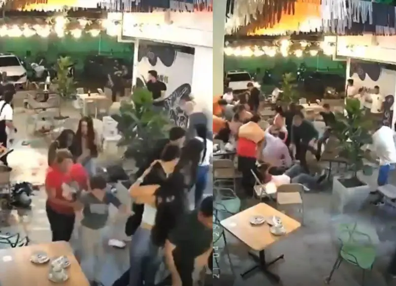 Ciudadanos salieron corriendo de un restaurante luego de percibir las detonaciones cerca al Batallón Agustín Codazzi, en Palmira, Valle. Foto: Captura de video redes sociales 