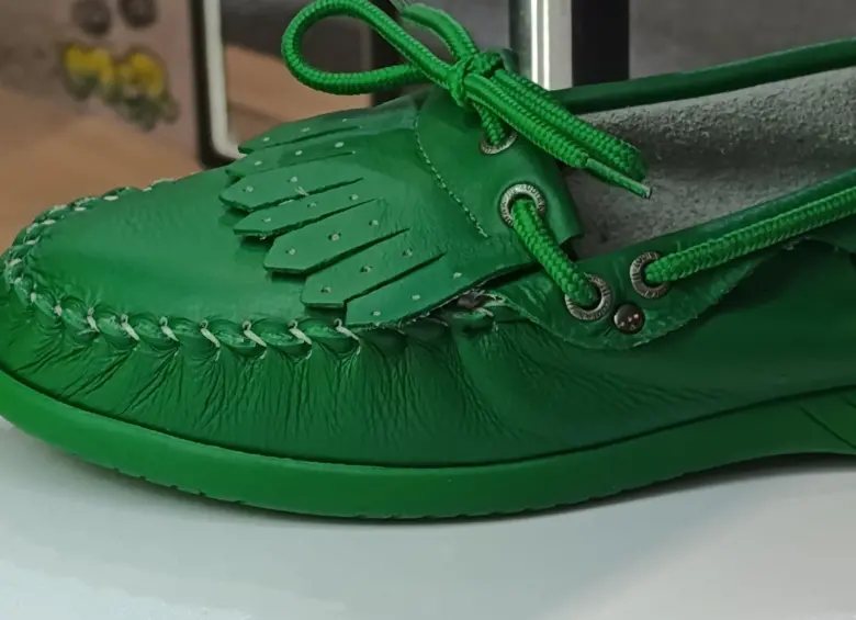 Durante su último videoclip Feid usó referencias de la marca Zodiak en colores verde y negro. Foto: Brian Ferney Valencia Ríos