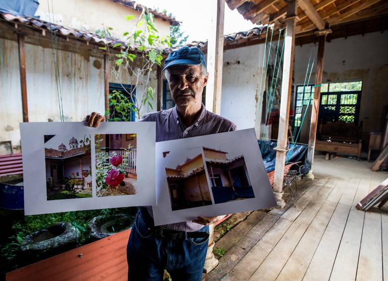 Jaime lleva años recopilando testimonio fotográfico del daño que le causaron a su casa. FOTO: JULIO HERRERA