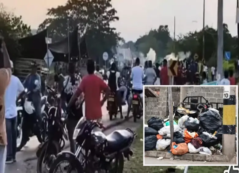 Adelante, basuras acumuladas en Caucasia. Atrás, un bloqueo en una de las vías. FOTO: imagen tomada de redes.