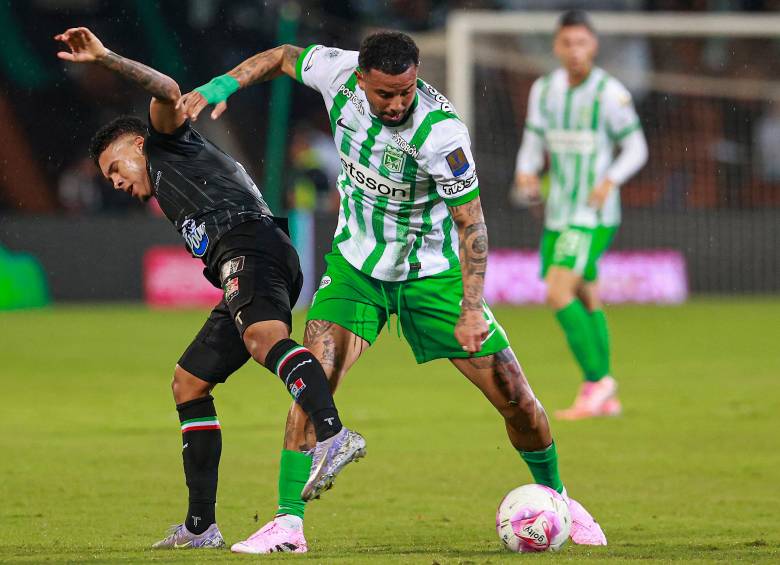 Imagen de uno de los últimos encuentros entre Nacional y Once Caldas, en la que aparece Edwin Cardona. FOTO MANUEL SALDARRIAGA