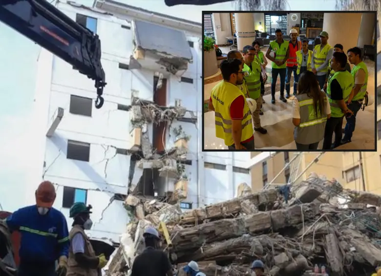 Atrás, uno de los edificios afectados por el terremoto en Cali. Adelante, sesión conjunta con funcionarios del AMVA. FOTO: Cortesía