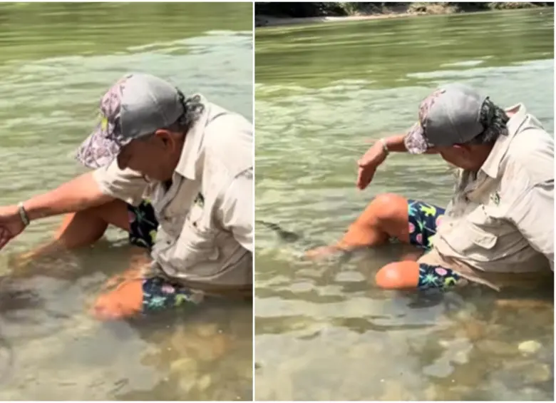 Momento antes de que el creador de contenido fuera mordido por la nutria. FOTO: CAPTURA VIDEO REDES SOCIALES @el_mago_martin_pescador