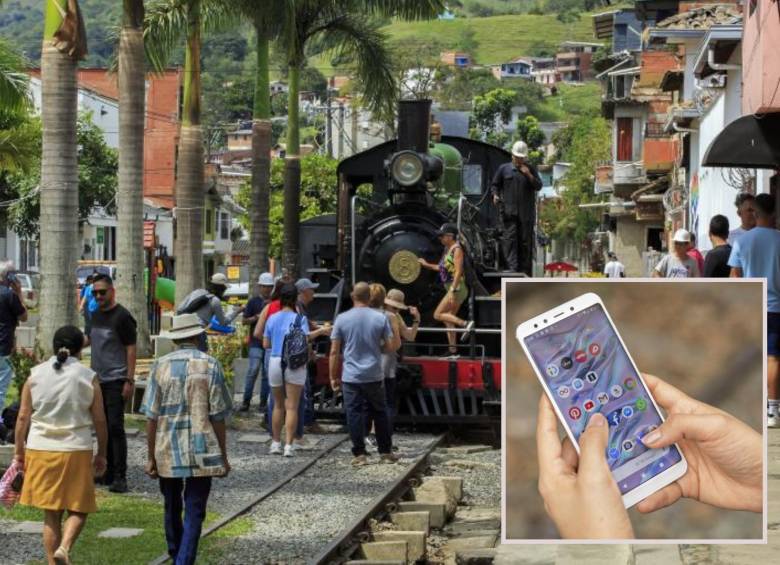 Adelante, uso de un equipo movil. Atrás, el nuevo atractivo turístico del municipio de Cisneros. FOTO: Andrés Suárez Echeverry