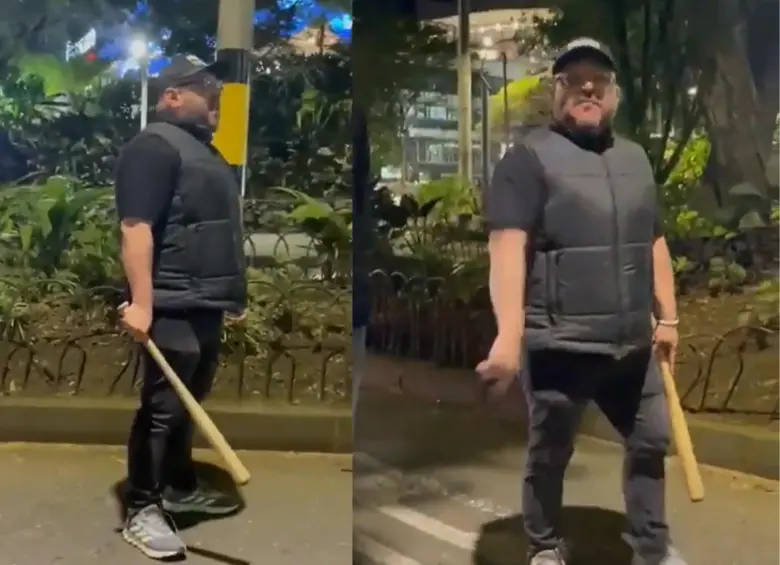 El concejal del Centro Democrático, Andrés Rodríguez, amenazando manifestantes en la ciudad de Medellín. FOTO: Captura de video