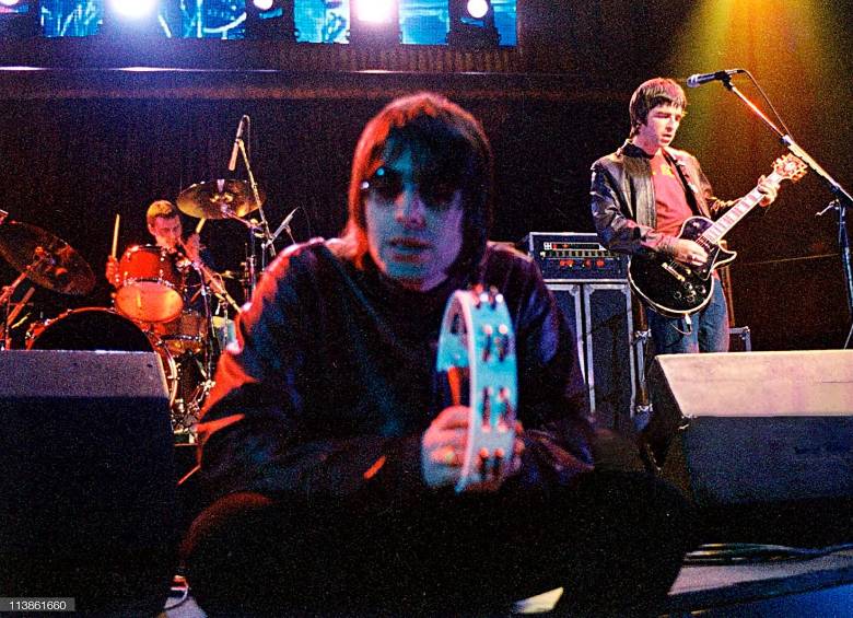 En su momento de mayor esplendor, Oasis conjugó el talento compositivo de Noel y la voz singular de Liam Gallagher. Foto: Getty.
