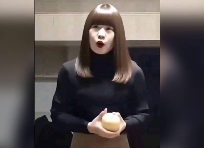 “Sister Hong”, el apodo con el que se hizo viral, pedía frutas, aceite o pescado a cambio de encuentros sexuales. Imagen, captura de video. 