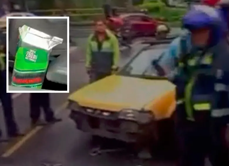 El conductor de este vehículo amarillo se le encontró una caja de aguardiente al lado de su asiento. Cuando le iban a inmovilizar el carro, arrolló a un agente de tránsito. FOTO: CORTESÍA