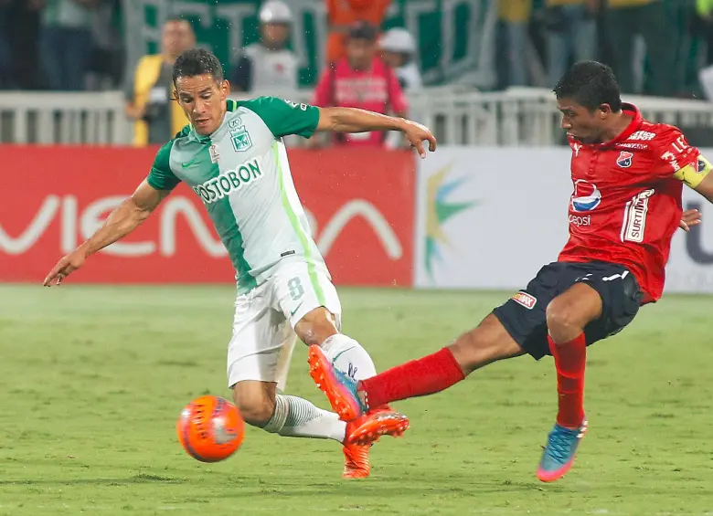 Diego Arias y Christian Marrugo, ambos hacían parte de las nóminas de Nacional y DIM, la última vez que jugaron un clásico como líderes de la Liga. FOTO MANUEL SALDARRIAGA