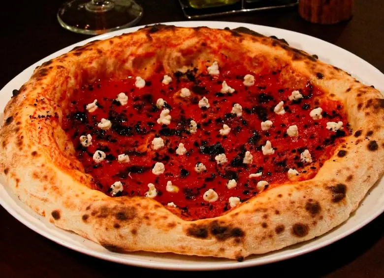La pizzería bogotana brilló en la edición de The Best Pizza Awards 2025, ubicándose en el puesto 80 en el Top 100 de los mejores pizzeros del mundo. FOTO Cortesía