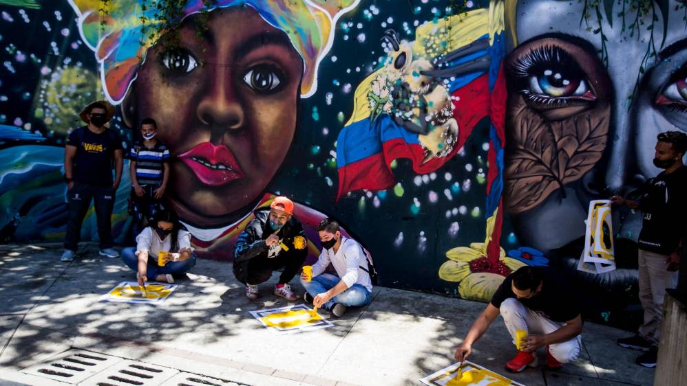 Esta es la preparación de la reactivación del Graffitour en la Comuna 13, con todos los reglamentos de bioseguridad. Foto: Julio César Herrera