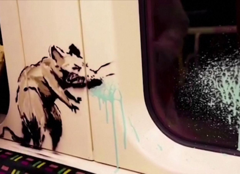 Banksy se subió al metro para hacer consciencia sobre el uso del tapabocas en el transporte público. Foto: captura de pantalla.