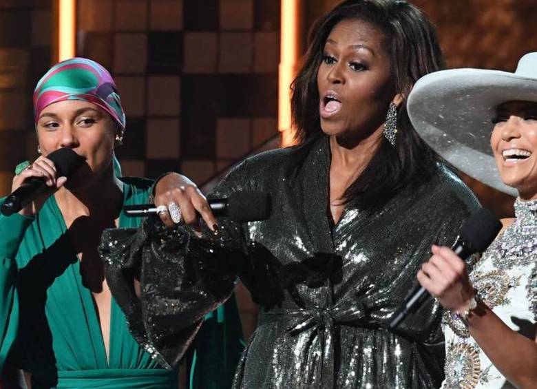 La cantante y compositora estadounidense Alicia Keys, la ex primera dama estadounidense Michelle Obama y la cantante estadounidense Jennifer López. Foto: Afp
