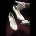 AP - En la muestra los asistentes podr&#225;n observar los zapatos que luci&#243; Catalina, forrados en la misma tela que utiliz&#243; Sarah Burton para crear el traje.