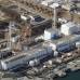 AP - Gr&#250;as rojas y blancas pasan a trav&#233;s de los reactores devastados por el tsunami en la planta Fukushima Dai-ichi.