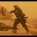 AP - Soldados de la infanter&#237;a de marina se cubren tras un ataque al sur de Bagdad el 26 de marzo de 2003.