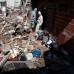 AP - Además de las viviendas, el local y los autos destruidos, más de una decena de inmuebles sufrieron daños, entre ellos un centro de asistencia para niños.