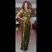 Colprensa - Vestido de coronaci&#243;n, dise&#241;o de Beatriz Camacho, en pallete de lentejuelas verdes, con accesorios en cobre.