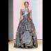 AP - Organzas, satenes o veraniegos linos hacen parte de las telas seleccionadas por Carolina Herrera.