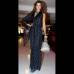 Colprensa - Un vestido de Beatriz Camacho, gris humo, cruzado al frente, sencillo y liviano.