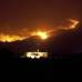 AP - En La Palma, tambi&#233;n en Canarias y conocida como la &quot;isla verde&quot;, con un gran valor medioambiental, otro fuego declarado el lunes oblig&#243; al desalojo de unas cien personas.