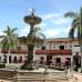 Cortes&#237;a de Antioquia Presente - En 1983, la Corporaci&#243;n Antioquia por el Cauca, como se llam&#243; inicialmente Antioquia Presente, particip&#243; en la reconstrucci&#243;n de Cajib&#237;o, Cauca, tras el terremoto de Popay&#225;n. Aport&#243; 134 casas y 7 equipamientos urbanos.