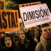 Reuters - Los manifestantes exhibieron carteles que exigían la dimisión del presidente español.