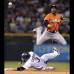 AP - El jugador de los Marlins de Florida Adeiny Echavarría, arriba, salta por encima del jugador de los Rockies de Colorado Michael Cuddyer (3) en la segunda base y observa su tiro a la primera en el sexto inning de un partido de béisbol en Denver, Estados Unidos.