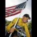 Foto AP - Lance Armstrong por la bandera de Estados Unidos como campe&#243;n del Tour con el Discovery.