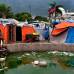 Reuters - Una imagen y su t&#237;tulo (Squalid Conditions, Condiciones miserables) describieron a la perfecci&#243;n la angustia que vivieron los habitantes de Puerto Pr&#237;ncipe, Hait&#237;, despu&#233;s del terrible terremoto. Esta foto le vali&#243; a Ricky Carioti del Washington Post el premio Pulitzer a fotograf&#237;a.