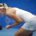 AP - Tradicional grito de Maria Sharapova de Rusia luego de conseguir unos puntos durante su partido contra la rusa Svetlana Kuznetsova en el torneo de tenis Abierto de China.