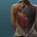 AP - Una mujer muestra su tatuaje durante la primera convenci&#243;n internacional de tatuaje en China.