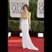 AP - Michelle Dockery, perfecta en un Alexandre Vauthier ajustado hasta el suelo en color blanco, con encaje dorado en la parte superior y cuello alto.