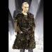 Reuters - En el Grand Palais de Par&#237;s, la mujer Chanel del invierno pr&#243;ximo lucir&#225; en la espalda peque&#241;as capas de plumas.
