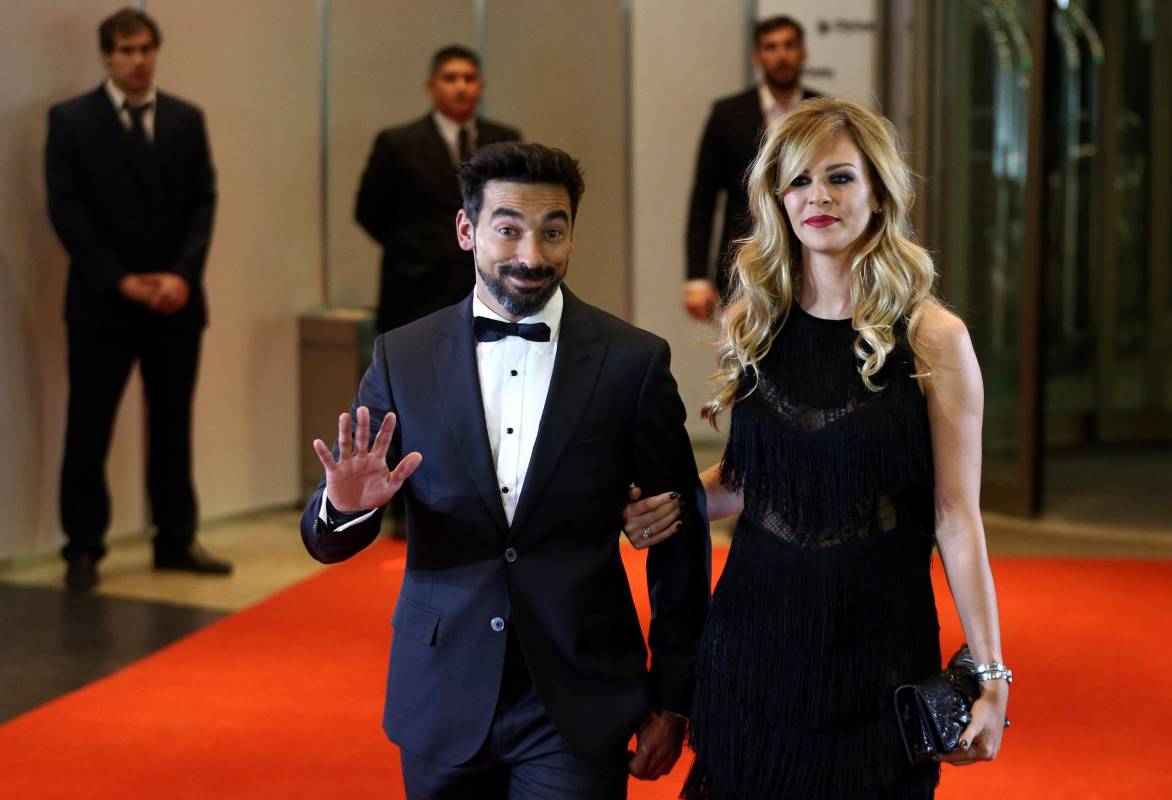 Ezequiel Lavezzi acudió en compañía de Yanina Screpante. FOTO REUTERS