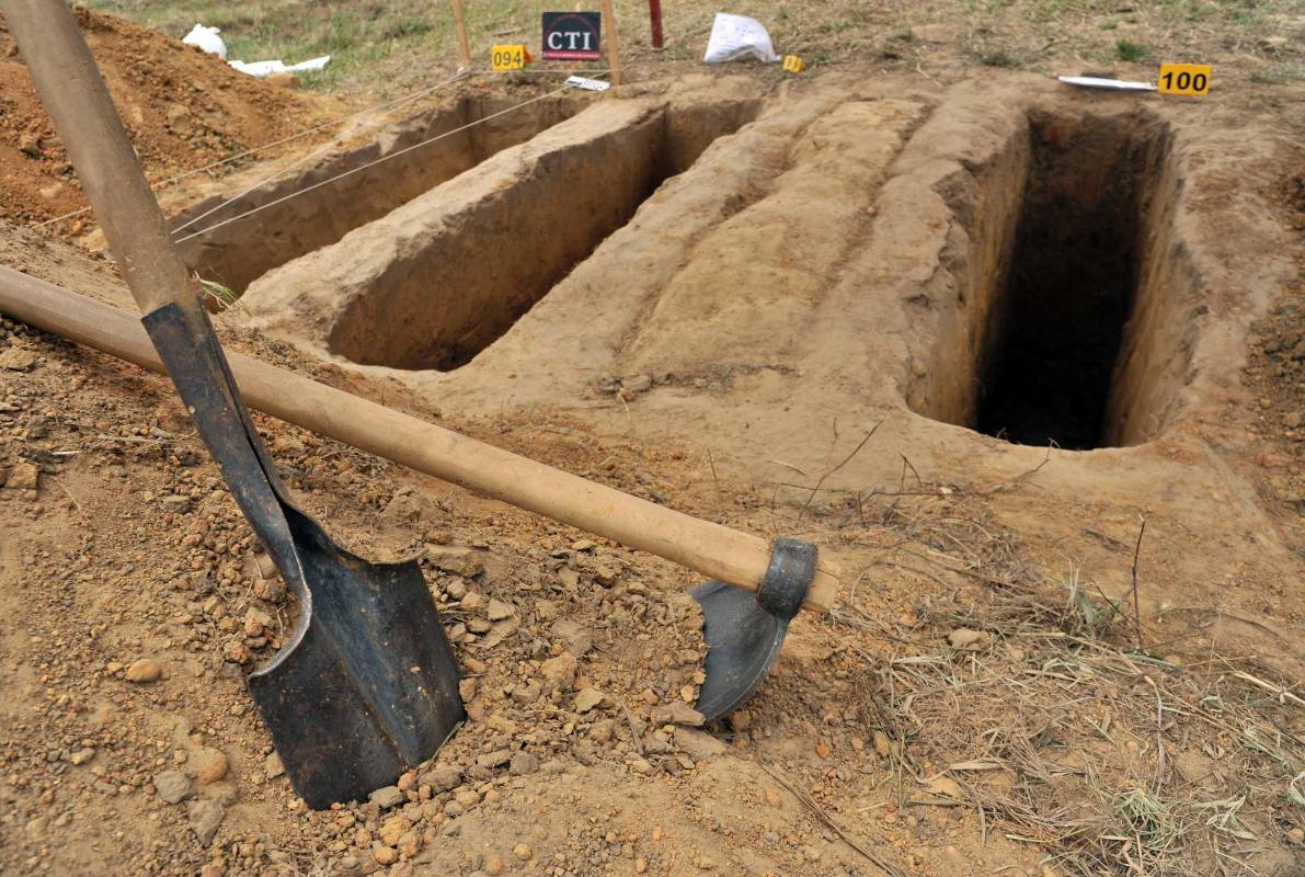 Las autoridades han intensificado sus labores para tratar de identificar a los miles de colombianos que por causa del conflicto armado de más de cinco décadas fueron sepultados sin identificar. FOTOS Guillermo Legaria / AFP