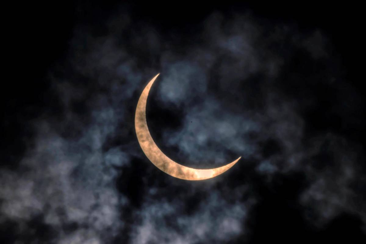 El eclipse solar visto en Guangzhou, China, el 21 de junio de 2020. La fase anular de este raro eclipse solar de solsticio fue visible desde partes de África y el sur de Asia. FOTO EFE