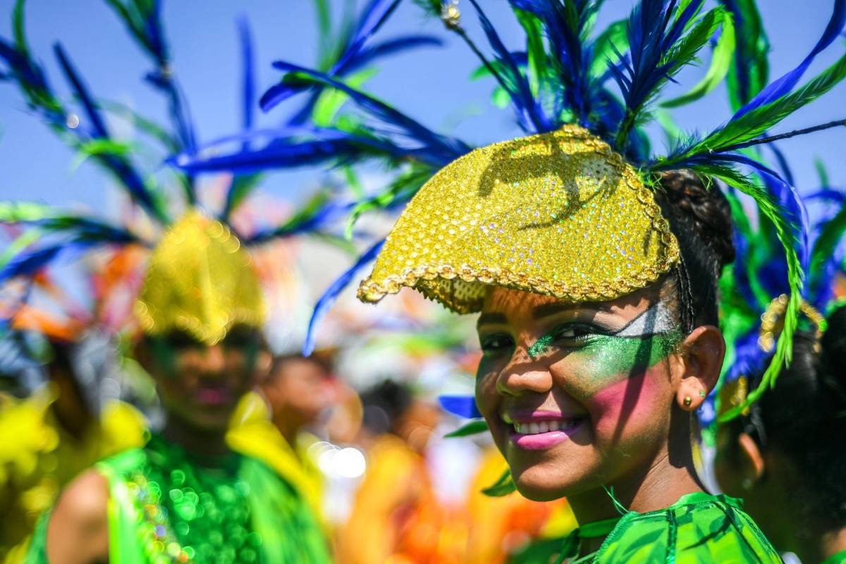 Una de las novedades de este año en la Batalla de Flores fue la temática de la integración en la gran cuenca del Mar Caribe, que se relaciona con los Juegos Deportivos Centroamericanos y del Caribe que se realizarán en julio en esta ciudad. FOTO AFP
