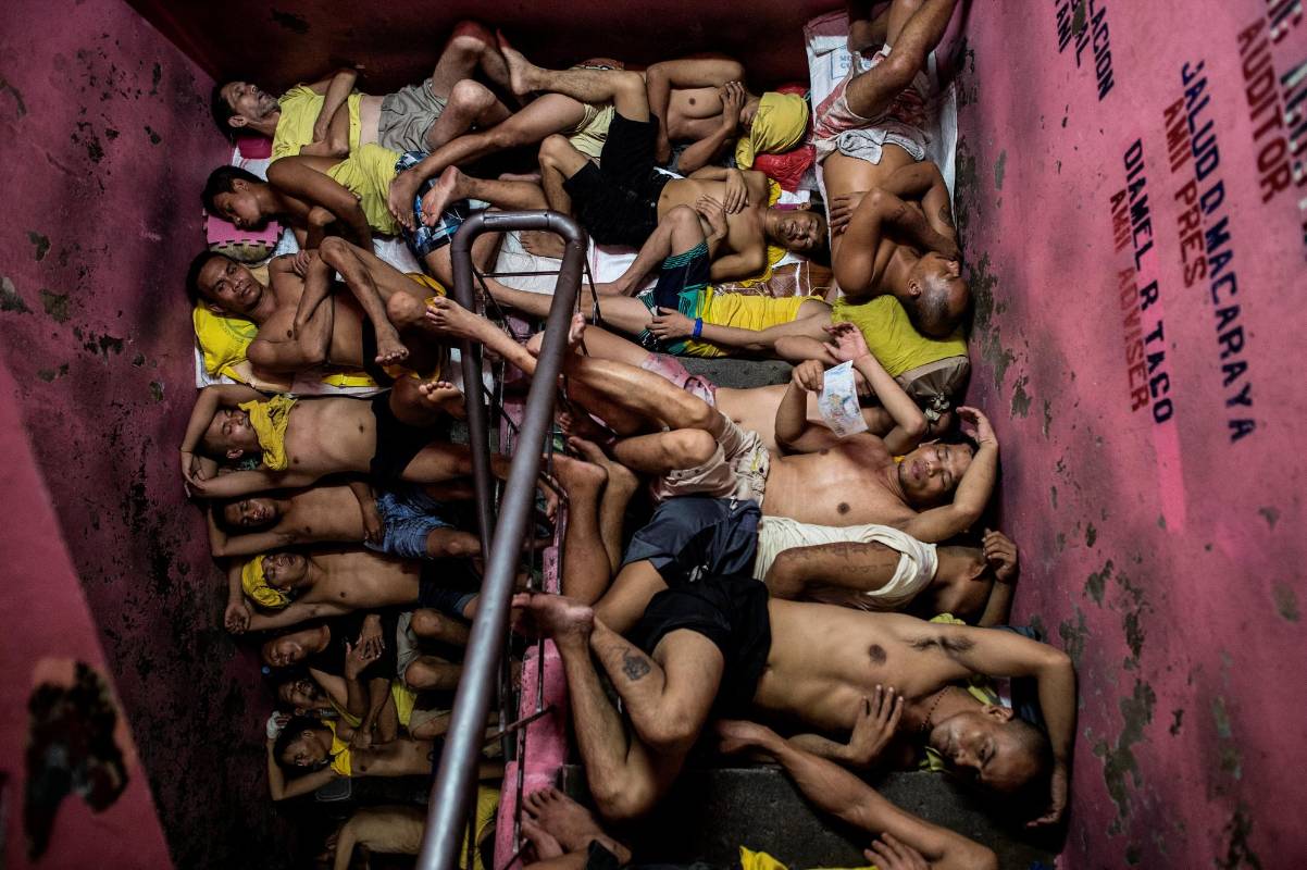 Las fotos muestran escenas de la cárcel de Quezon City, una de las prisiones más abarrotadas de Filipinas. Tercer lugar en noticias generales. Noel Celis, Agence France-Presse / Cortesía de World Press Photo Foundation 