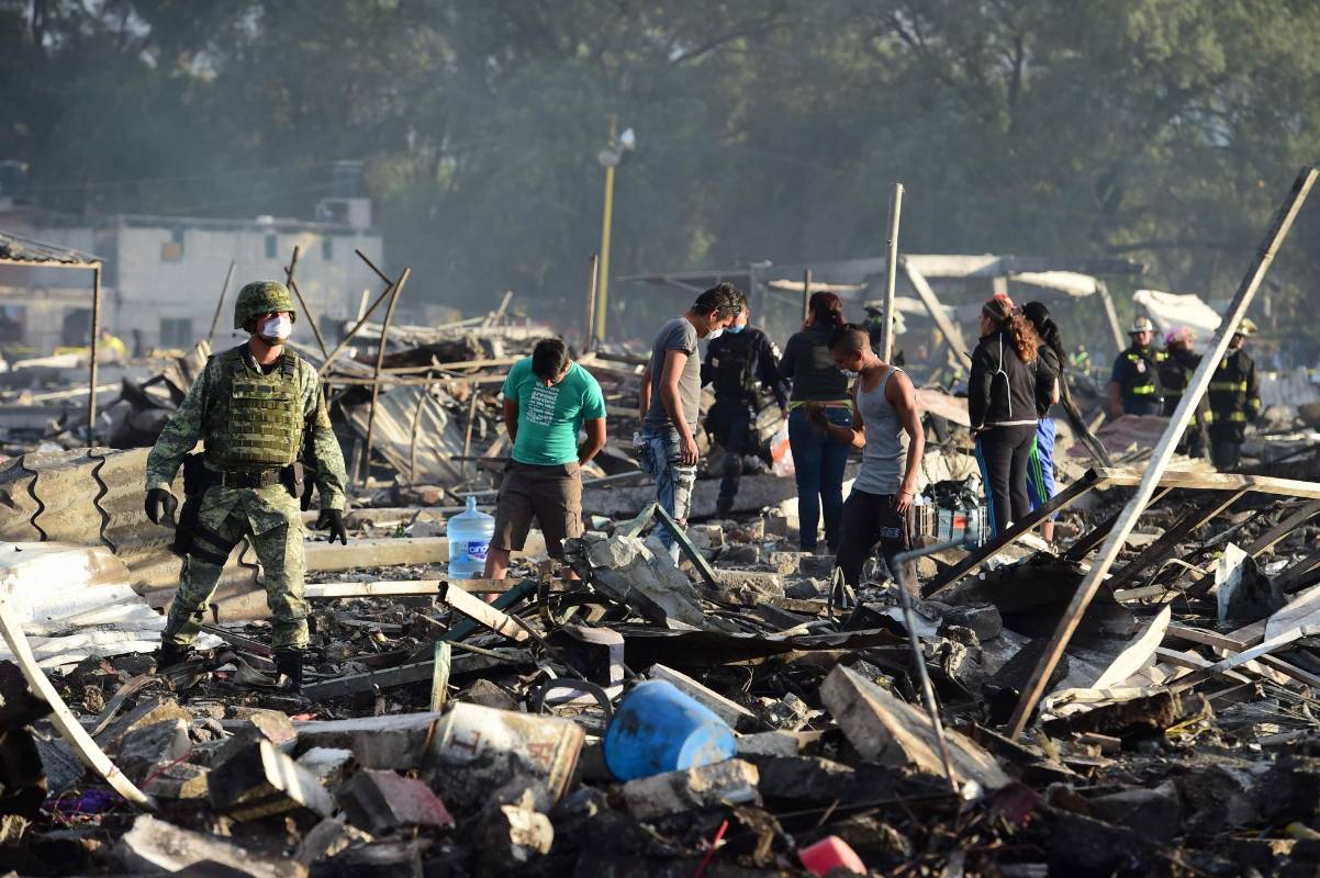 “Tenemos un saldo de 12 personas no localizadas o desaparecidas, que los familiares nos dicen que probablemente pudieran haber estado en el lugar de los hechos”, apuntó Gómez. FOTO AFP