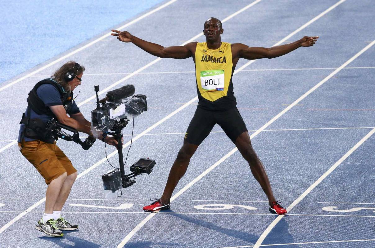 Bolt celebró su tercera medalla de oro olímpica en esta prueba. FOTO Reuters