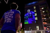 En las calles imágenes de los jugadores acompañaban el festejo. FOTO AFP