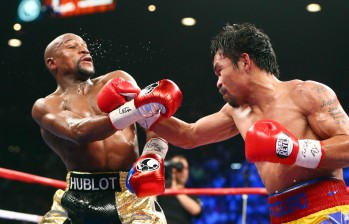 El boxeador filipino peleó con un problemas físicos en un hombro y no lo reportó a la Comisión. FOTO REUTERS