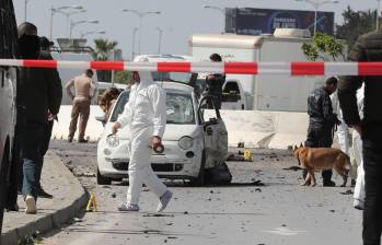 Las fuerzas de seguridad cerraron el acceso al centro de la ciudad como medida preventiva. FOTO EFE