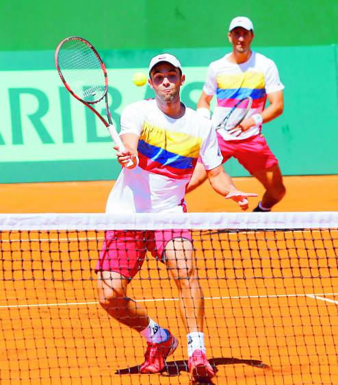 Juan Sebastián Cabal (adelante) y Robert Farah, los dos tenistas vallecaucanos que ilusionan en Río. FOTO COLPRENSA