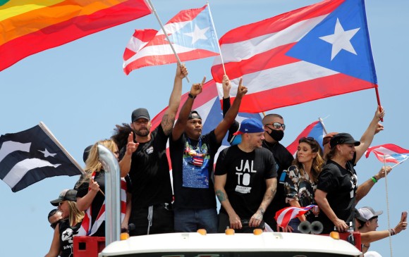 Bad Bunny, Residente, Ricky Martin y otros cantantes que se unieron a las protestas de Puerto Rico. FOTO: REUTERS