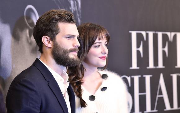 Jamie Dorman y Dakota Johnson se meten en la piel de Anastasia Steele y Christian Grey. FOTO AFP