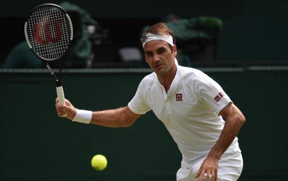 El suizo Roger Federer avanza en Wimbledon en busca de nuevas marcas y nuevos registros históricos para el tenis mundial. FOTO AFP